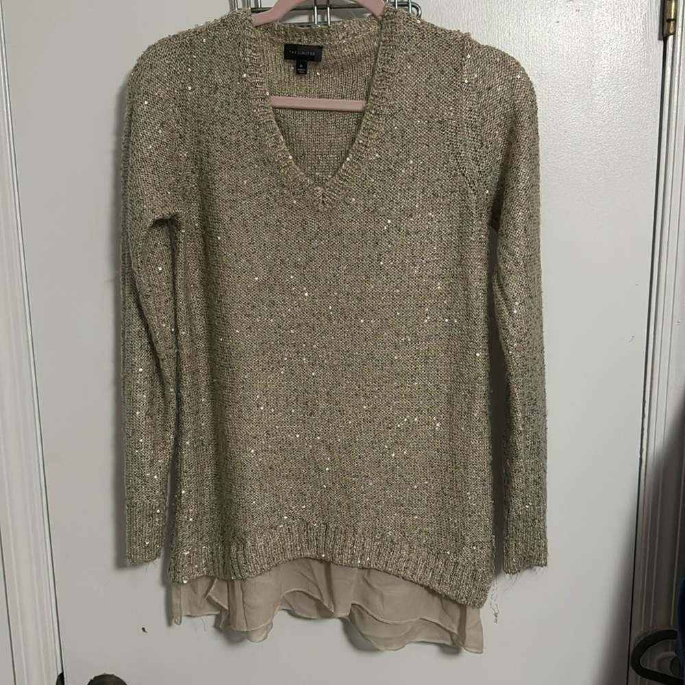 The limited women’s Medium sweater